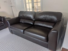 Three seater leather brown sofa