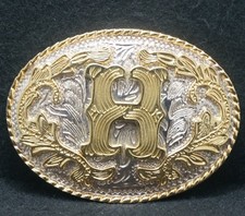 XE25133 NOS VINTAGE 1970s H INITIAL LETTER FASHION MENS GOLDTONE BELT BUCKLE