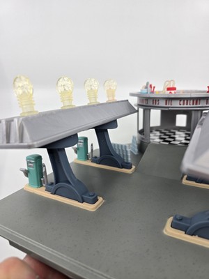 Disney Pixar Cars Flo's V8 Cafe Playset Radiator Springs Boxed