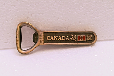 Vintage Canada Bottle Opener Brass Tone Metal Souvenir with Maple Leaf & Flag 4''