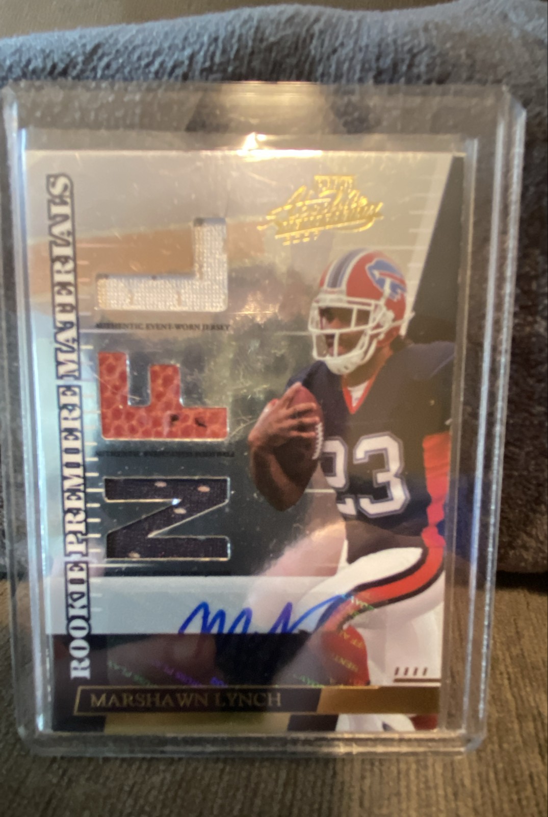 Marshawn Lynch Playoff Absolute Memorabilia Rookie Premiere Materials #259 Base