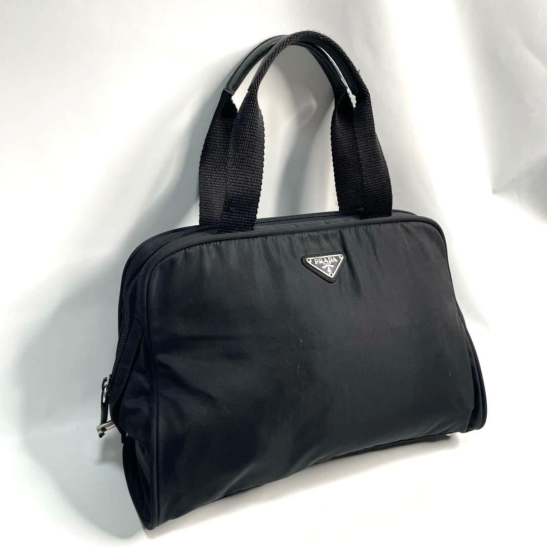 PRADA Prada handbag with triangular logo plate in… - image 1