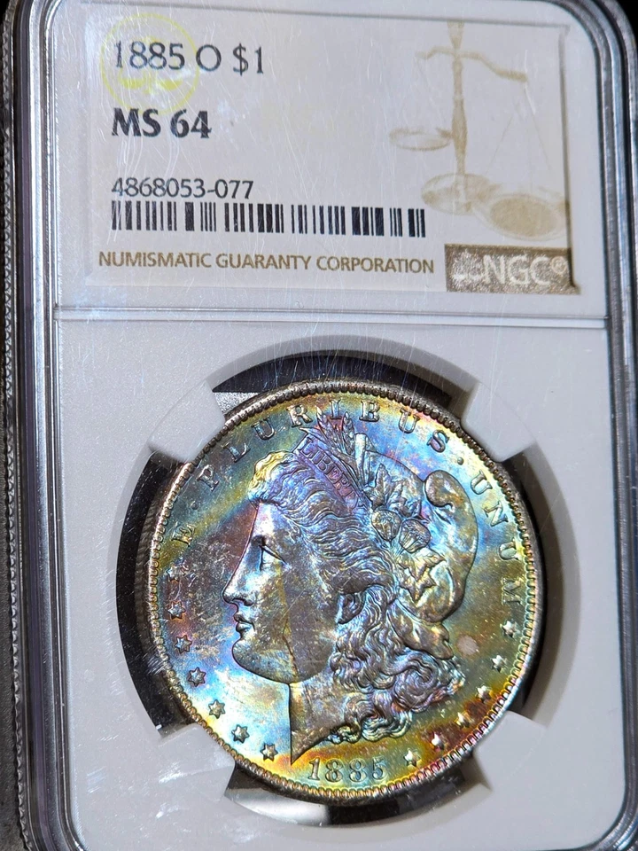 1885-O Morgan Silver Dollar NGC MS64 Rainbow Textile Tab Toned Coin Great Luster - Image 2 of 4