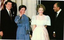 Vintage Postcard- Egyptian President Anwar Sadat and his wife welcomed  1960s
