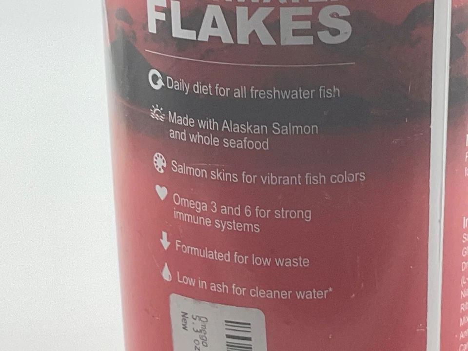 Copos nutritivos amarillos de comida para peces de agua dulce 5,3 onzas Omega exp 6/27 Foto 2 de 4