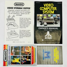 Atari 2600 Console Bundle: Joysticks, Paddles, Atari Force Comic, Organizer, Pin