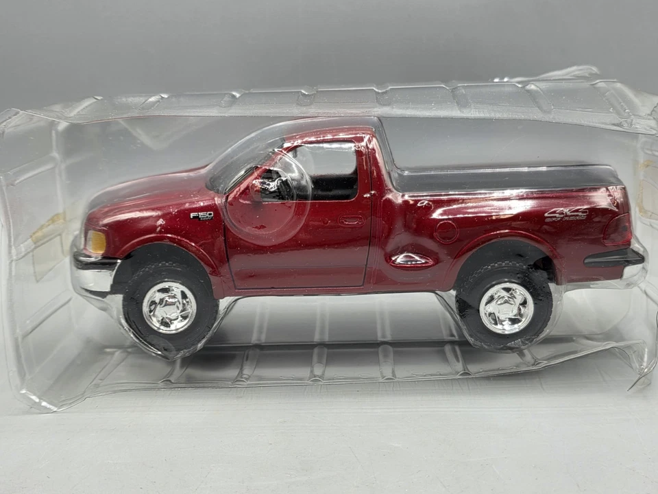 Camioneta pickup Ford F-150 XLT 1997 Maisto roja 4x4 escala 1:24 (2000) Foto 3 de 4