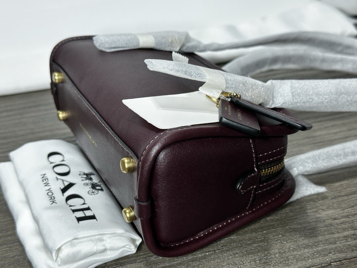 Coach Swing Zip Bag 20 in Black Currant Glovetanned Leather CAM45
