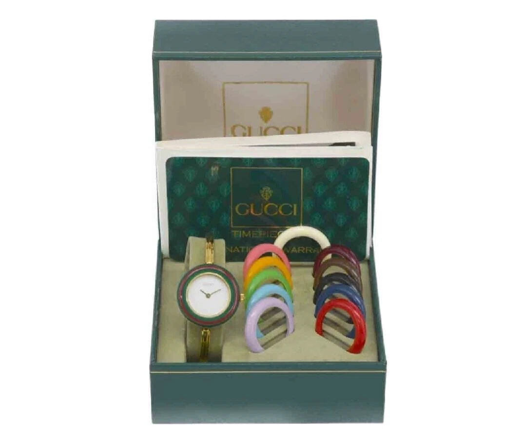Montre pour femme Gucci lunette de changement 12 couleurs blanc/or placage quartz d'occasion