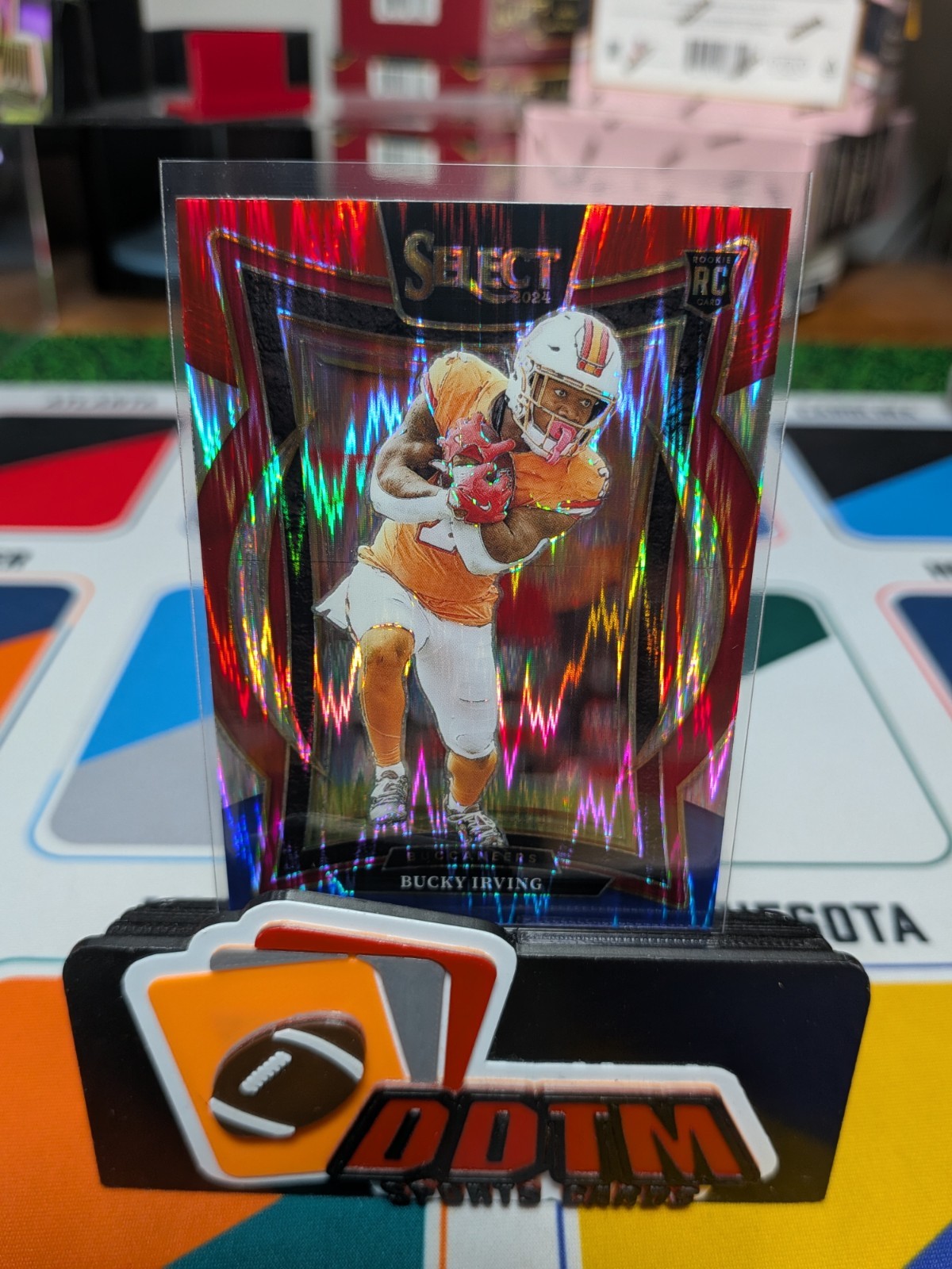 2024 Panini Select - Concourse Bucky Irving #4 Red & Blue Shock Prizm (RC)