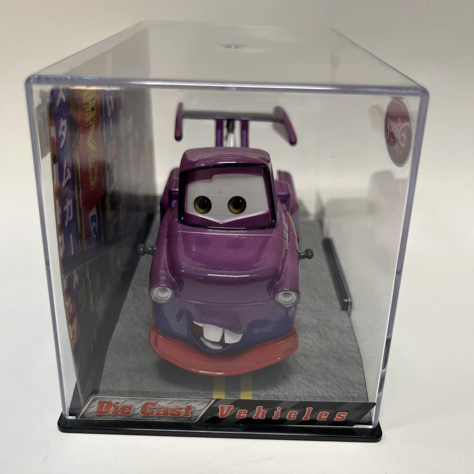 Disney Pixar CARS Púrpura Persecución Tokyo Mater Camión Tienda Disney NUEVO Foto 4 de 4