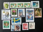 Lot of 15 stamps from various countries and various years - still on fragment! E58
