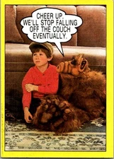 1987 Topps ALF #16 Cheer up. We'll stop falling of the couch eventually