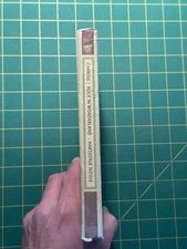 Alice's Adventures In Wonderland and Through The Looking-Glass by Lewis Carroll