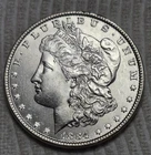 1884 P Morgan Silver Dollar. Estimated Uncirculated Mint State 64. A0580.