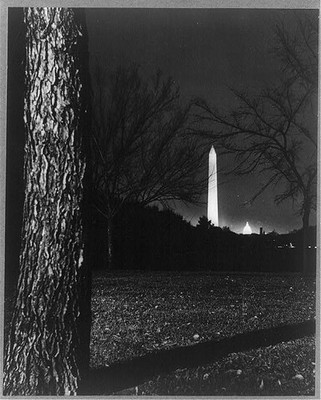 Photo:Washington Monument, view from distance framed between two trees