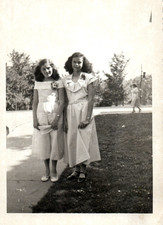 1950s Two Girls In Dresses Standing Outside Springtime Occasion Vintage Photo