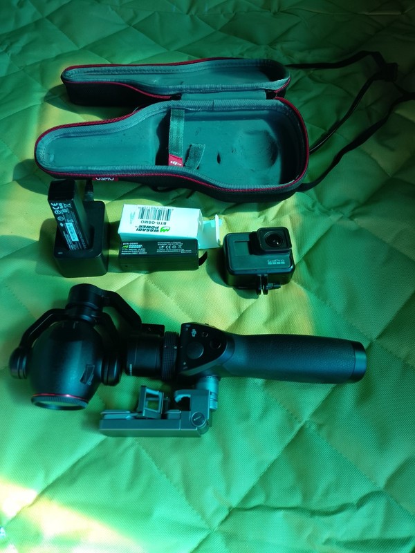 DJI Osmo Handheld Gimbal Stabilizer with Case PLUS SECOND ITEM GoProHERO 7 Black