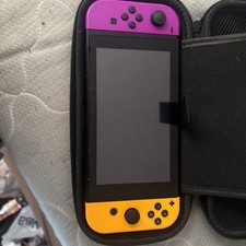 Nintendo Switch 32GB Handheld Console Neon Orange and Neon Purple Joy Cons