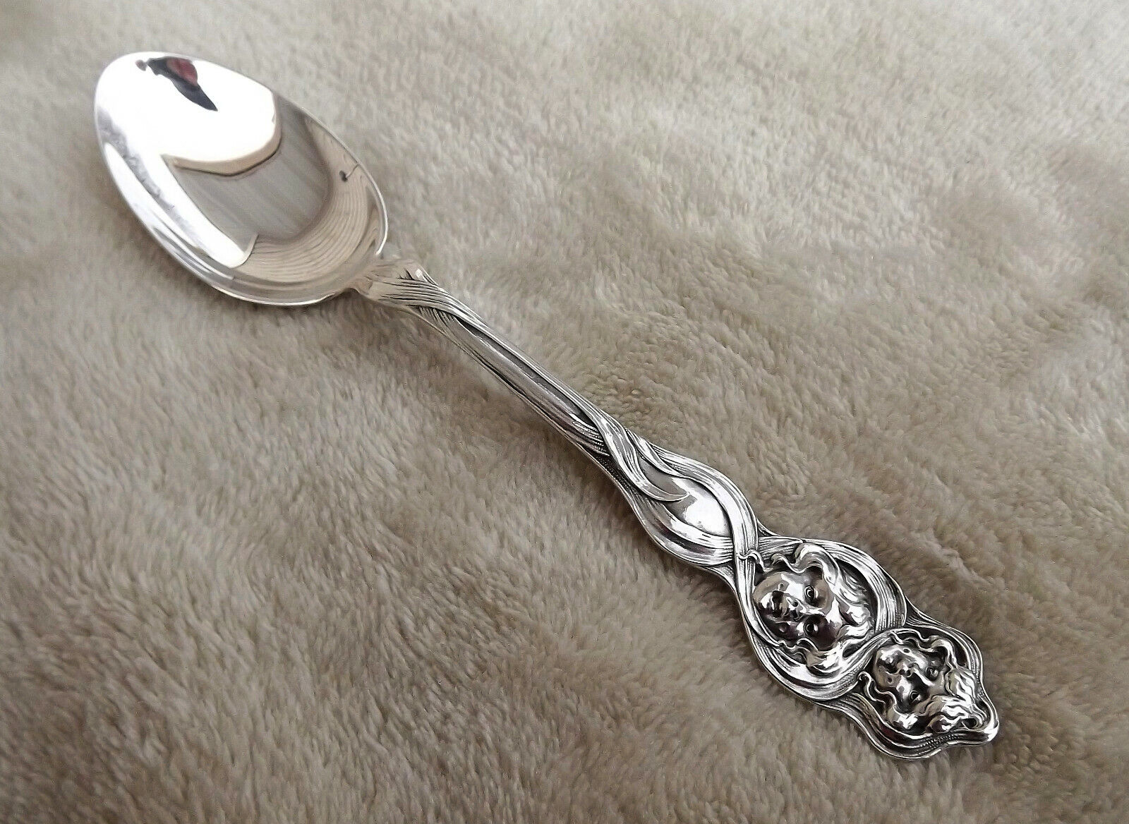 Cupid Sunbeams by Unger Brothers 6" Sterling teaspoon no mono circa 1904