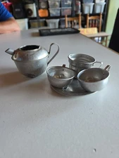 Vintage aluminum toy tea set