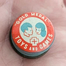 GOLD MEDAL Toys and Games Tin Cap Was fun for many children
