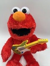 Sesame Street Rock, Rhyme Elmo Talking, Singing 14-Inch Plush Toy Works Great