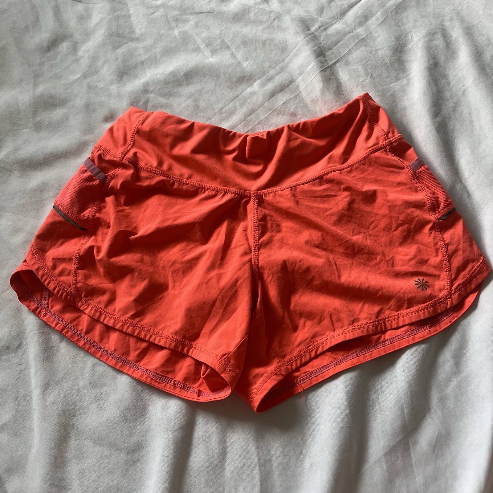 Athleta Running Shorts Women's M Neon Orange Pull On Pockets Lined Athletic