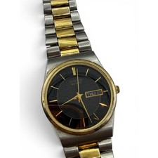 Vintage Citizen Quartz Day Date Watch Gold Tone Bezel Black Dial Two Tone Band