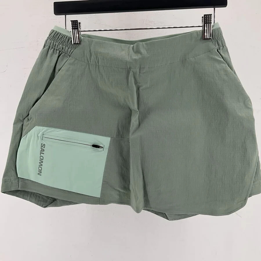 Nuovi con etichetta pantaloncini modulari da donna Salomon verde iceberg medio $90