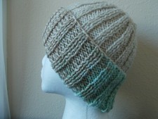 Hand knitted warm and cozy wool blend beanie/hat, green/beige pastel tan