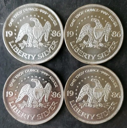 Lot of Four 1986 A-Mark 1oz Silver Liberty Rounds