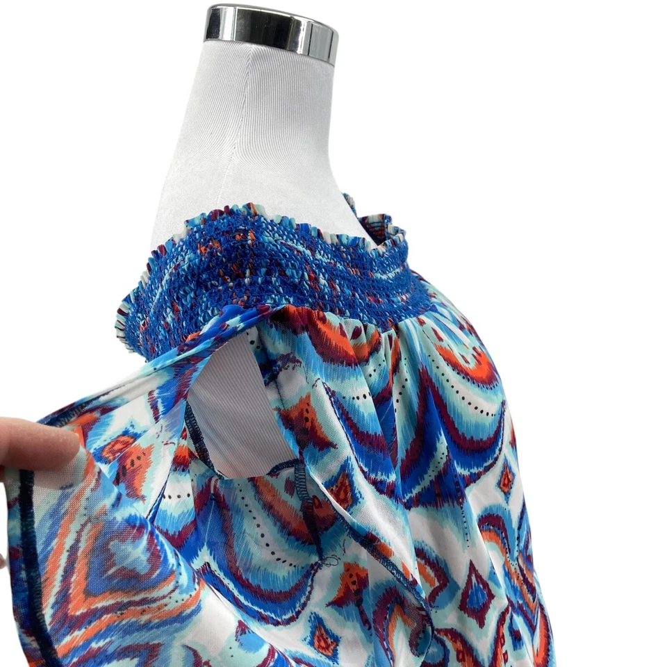 Blusa top bebe para mujer azul medio estampado geográfico manga abertura calada al hombro Foto 4 de 4