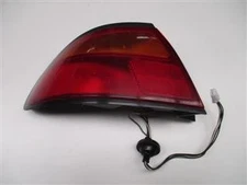 Rear light left Mazda 323 Berlina (BG)(1989->)