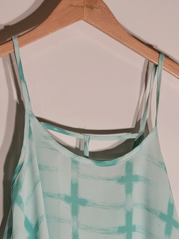 Camisa Soprano Niñas XS Turquesa Sin Mangas Detallada Espalda 100% Poliéster Foto 2 de 4