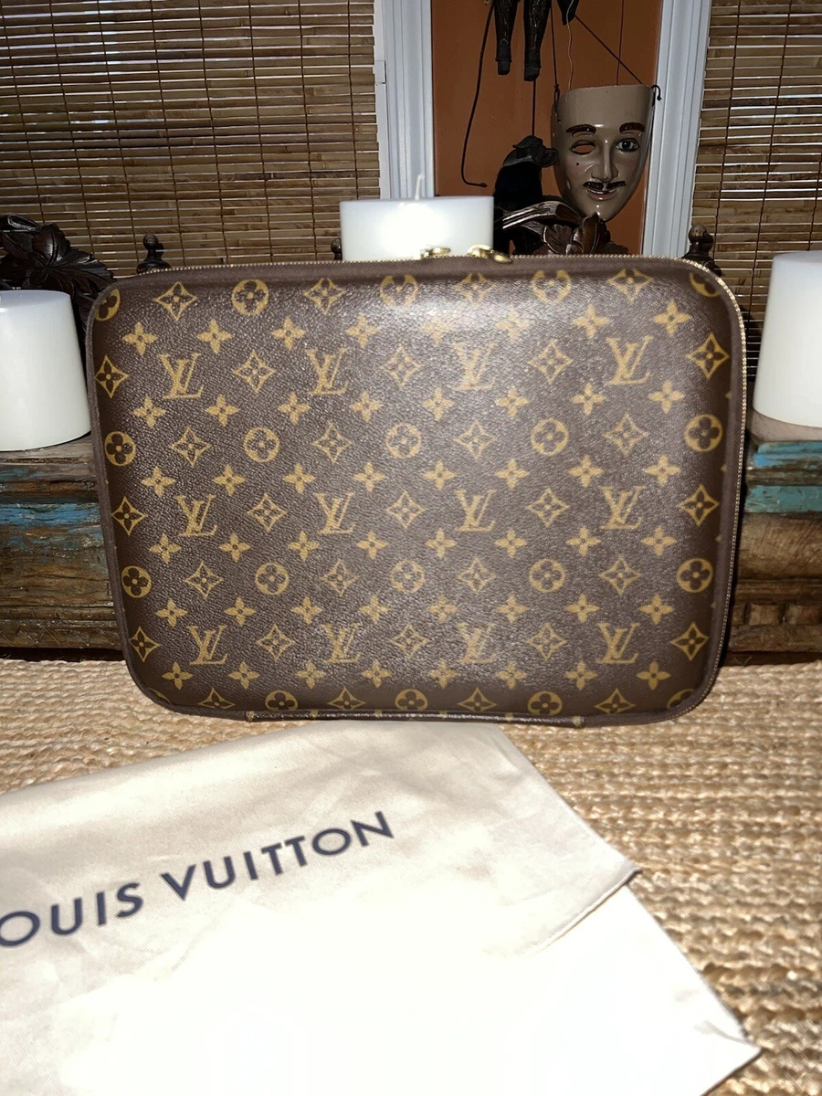 Vintage watch case with monogram pattern by Louis Vuitton, France