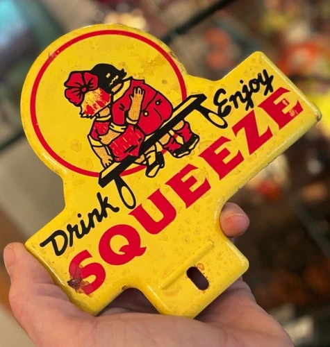 DRINK SQUEEZE SODA COLA 1950s ORIGINAL AUTO TAG SIGN FRAME GAS OIL VINTAGE METAL
