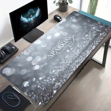 A Large Electronic Sports Gaming Mouse Pad with a Silvery Speckled Glittery Hig