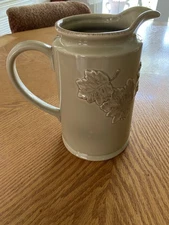 The Main Ingredients  Pitcher Tan w/ raised leaf pattern dishwasher safe  9"tall
