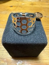 Air music soprano saxophone ligature honeycomb design