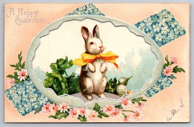 Easter Bunny Posing with Florals, egg, orange bowtie 1909 Postcard