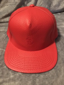 red stussy hat