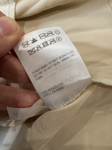 Top cielo Reformation 100% seta con bottoni colore avorio - Foto 10 di 11