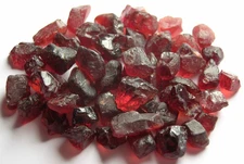 GARNET / MALAYA VARIATION, PINKISH ORANGE ROUGH FOR FACETING, TANZANIA, AFRICA