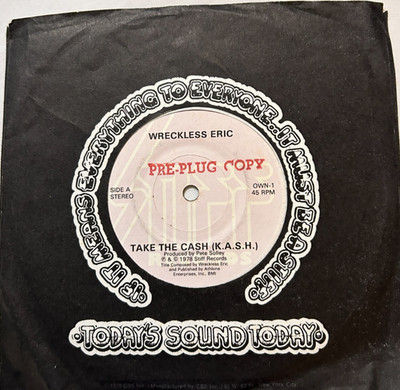 Wreckless Eric - Take the Cash (KASH) / Let's Go - 1978 Stiff 45 rpm + Sleeve EX