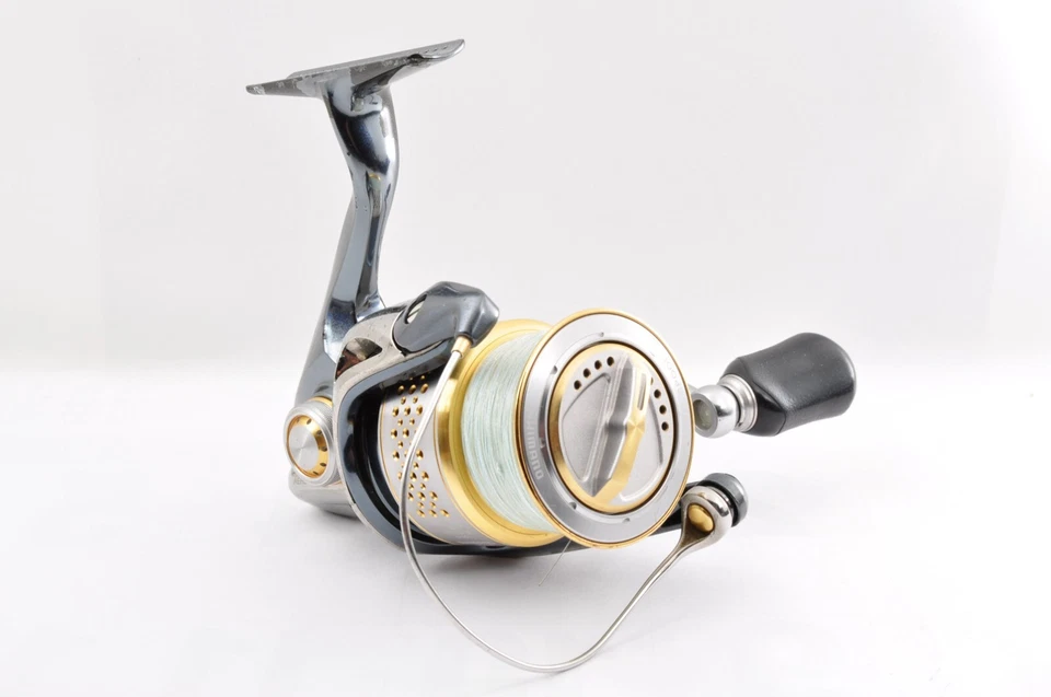 Carrete giratorio de pesca Shimano 10 Stella 2500 5,3:1 225 g sin bolsa gris usado manual Foto 4 de 4