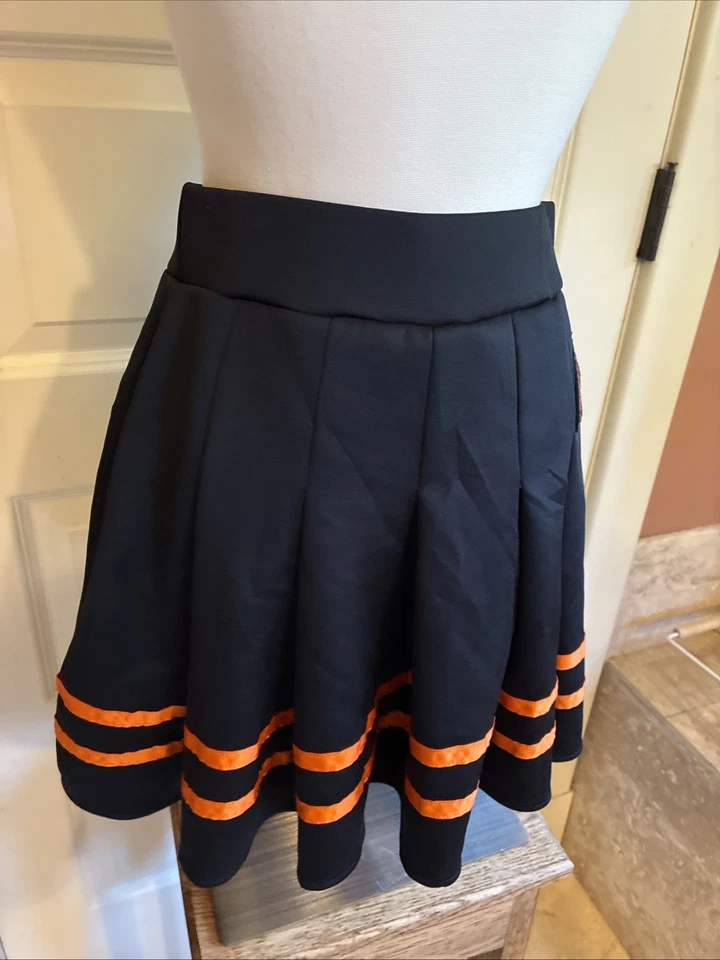 Falda Plisada Calabaza Spirit Halloween Rayas Negras Naranja Talla Pequeña (Talla 27) Foto 3 de 4