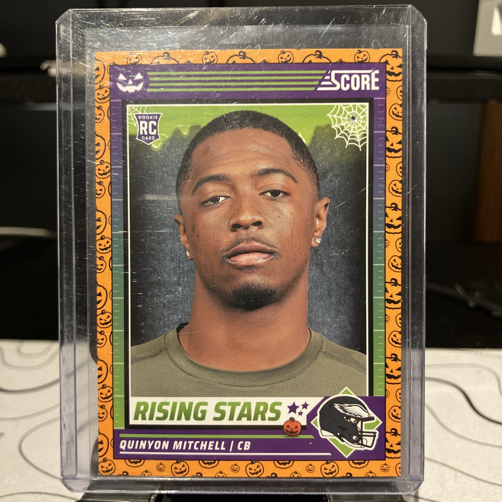 2024 Score-A-Treat Rising Stars Orange Pumpkins Rookie Card #41 Quinyon Mitchell