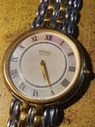 Seiko vintage quartz SS & gold tone watch with mother of pearl face unisex