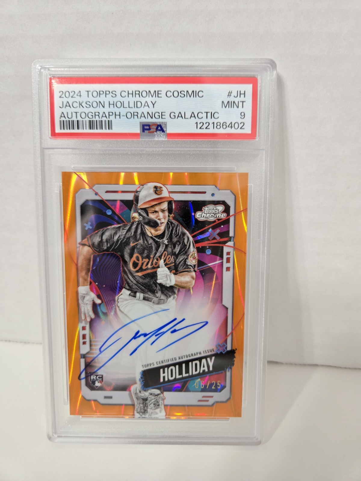 2024 Topps Cosmic Chrome Orange Galactic Jackson Holliday AU, RC/25 PSA 9